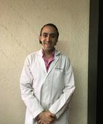 Dr. Victor Achar Samra